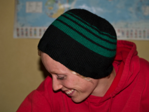 hand knitted black and green beanie hat